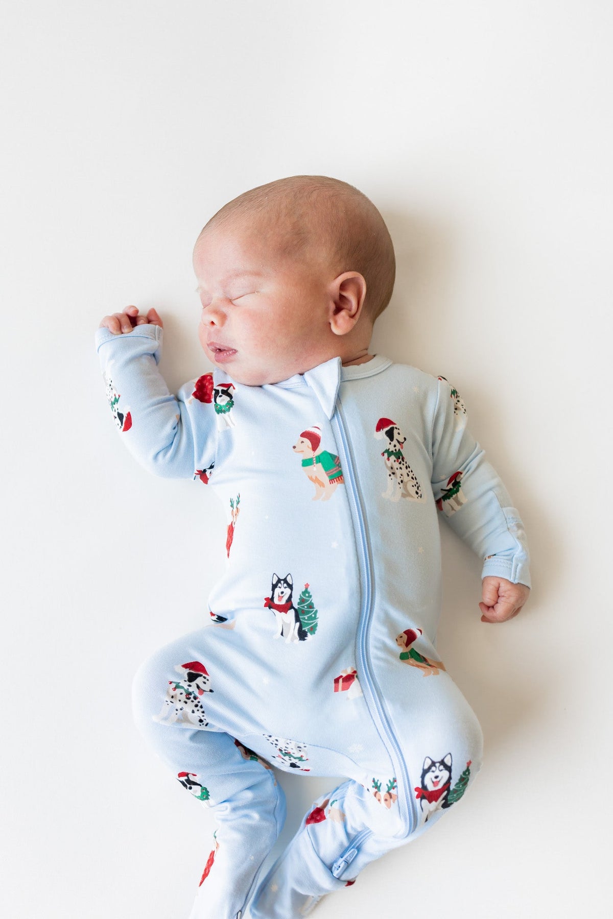 Kyte Baby Zippered Footie in Holiday Pups - Princess and the Pea Boutique