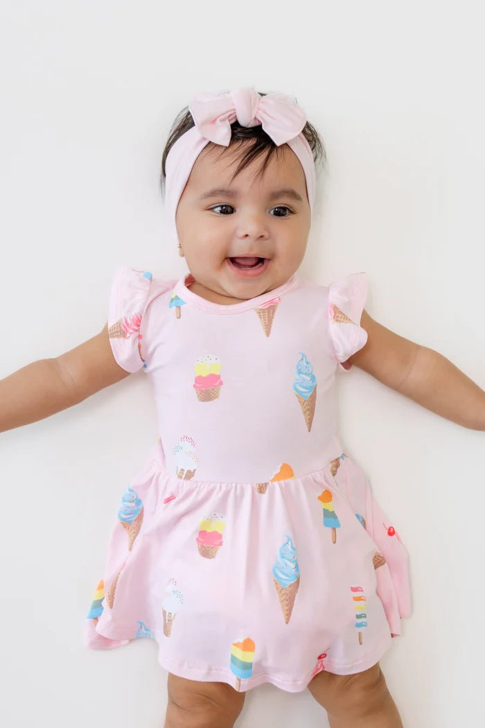Kyte Baby Twirl Bodysuit Dress in Sakura Ice Cream - Princess and the Pea Boutique