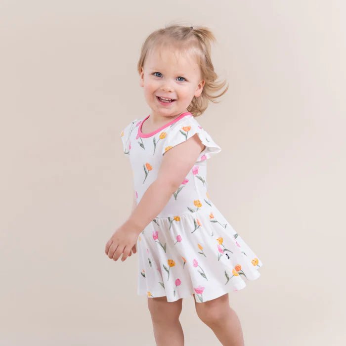 Kyte Baby Twirl Bodysuit Dress in Tulip - Princess and the Pea Boutique
