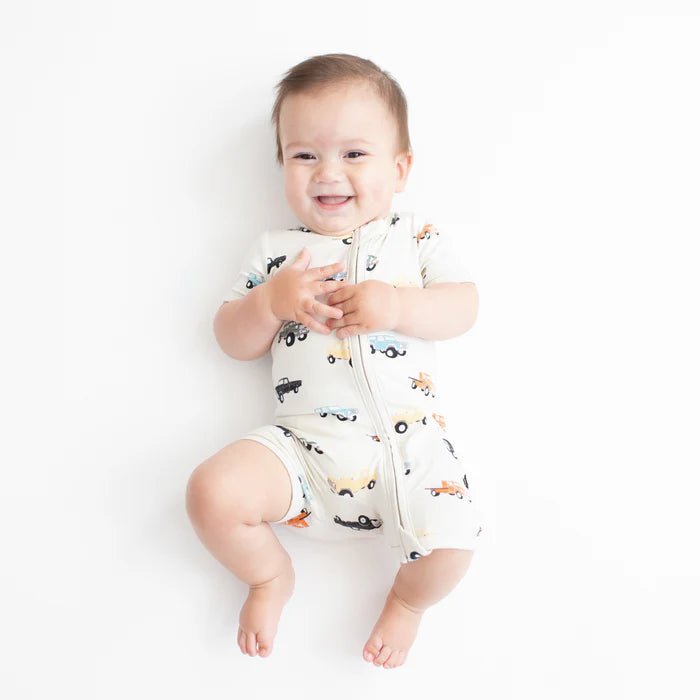 Kyte Baby Zippered Shortall Romper in Vintage Truck - Princess and the Pea Boutique