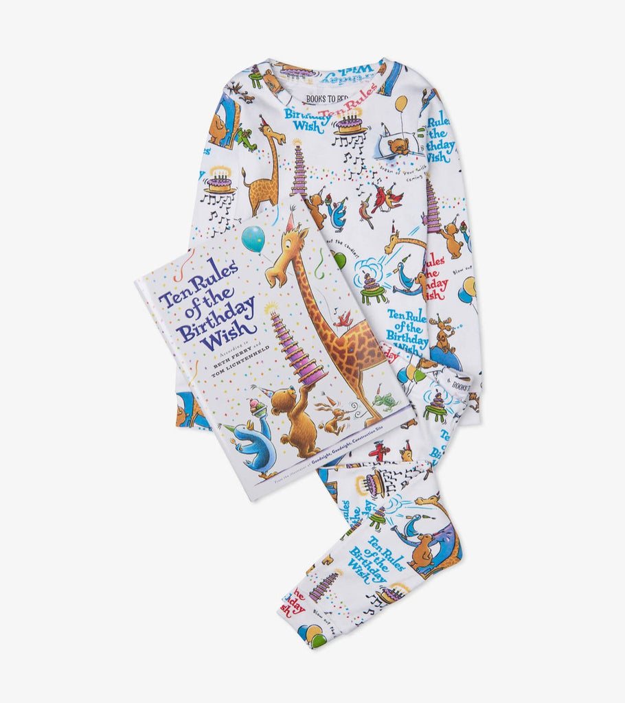 Books to bed - Ten Rules of the Birthday Wish Pajama Set Hanging with book - Princess and the Pea