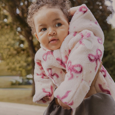 Petit Lem Bow Print on Soft Pink Sherpa Hooded Bunting Playsuit
