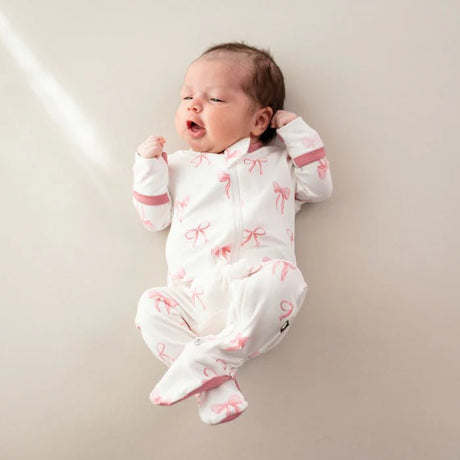 Kyte Baby Zippered Footie in Bow - Princess and the Pea Boutique