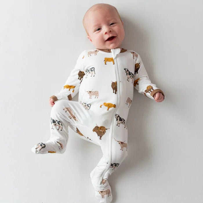 Kyte Baby Zippered Footie in Moo - Princess and the Pea Boutique