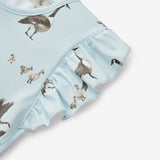 Milkbarn Goose Ruffle Pocket Bib - Princess and the Pea Boutique
