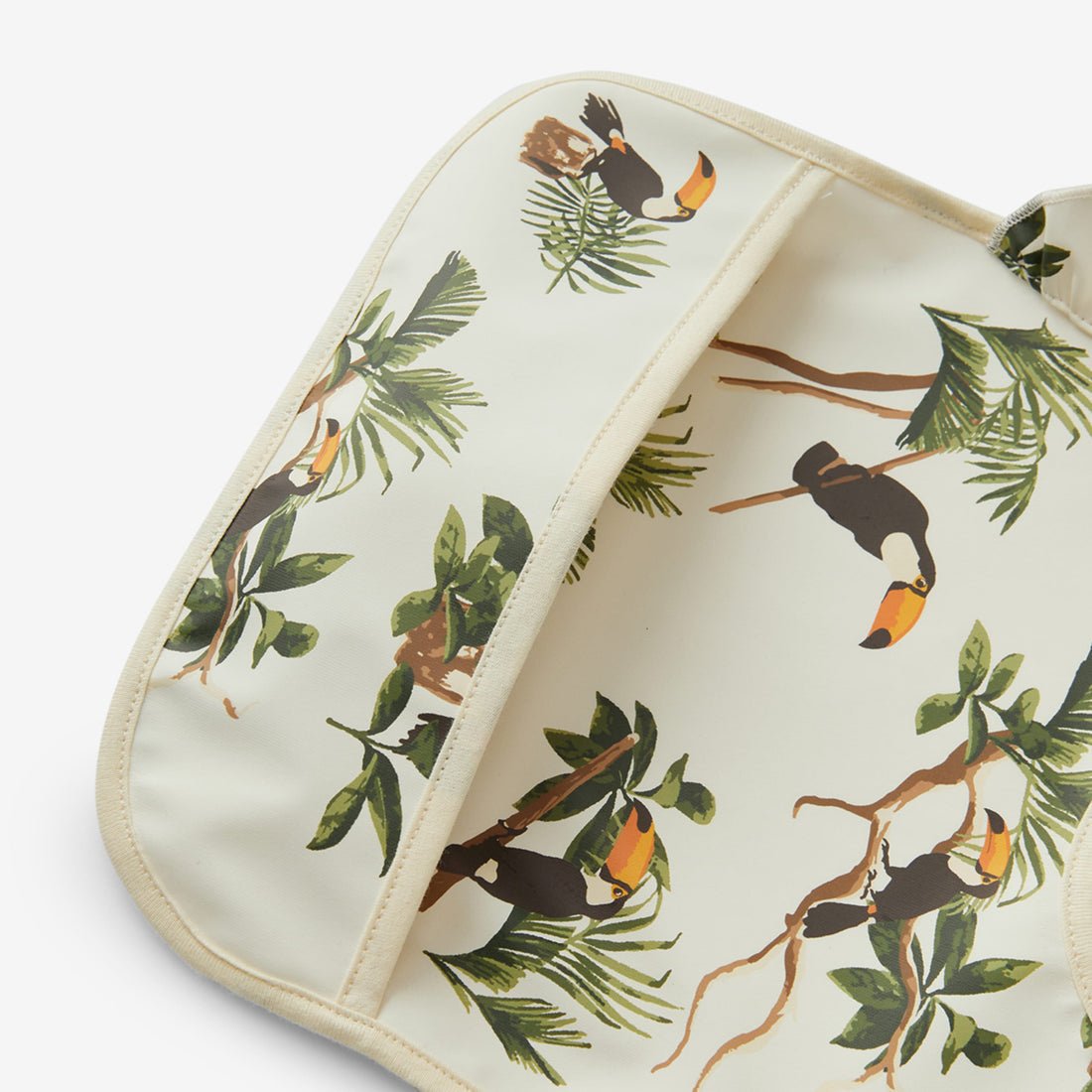 Milkbarn White Toucan Ruffle Pocket Bib - Princess and the Pea Boutique