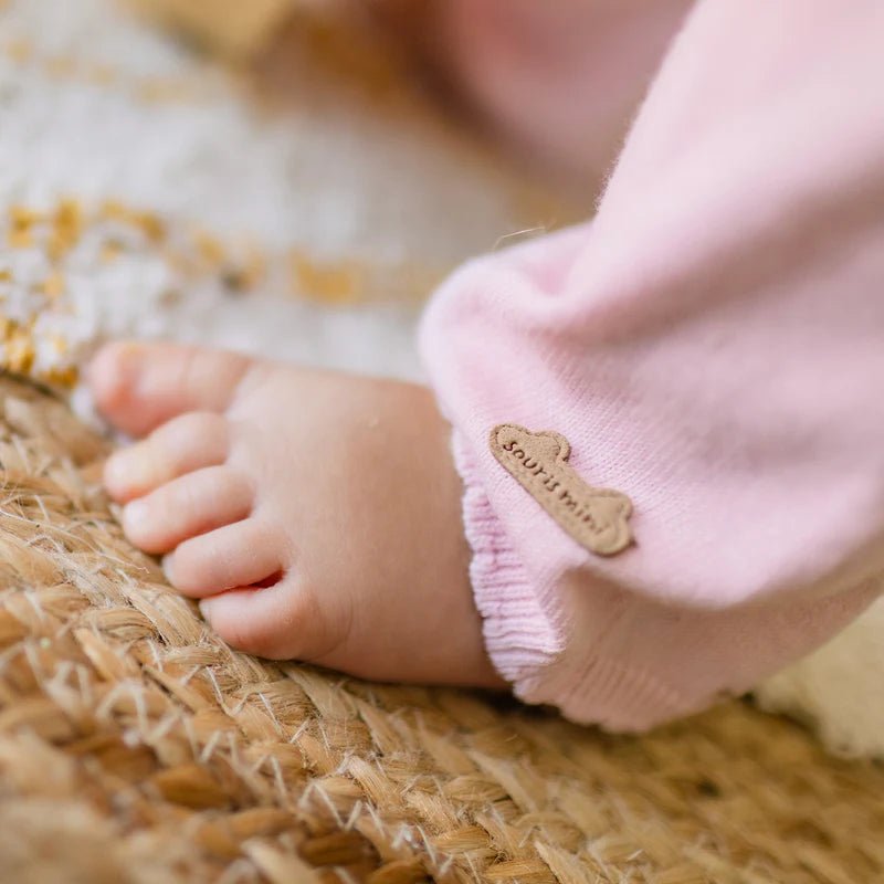 Pink knit one - piece with patterns - Princess and the Pea Boutique