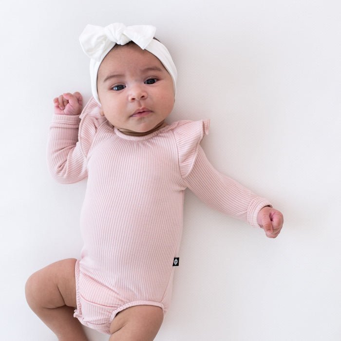 Kyte Baby Ribbed Long Sleeve Ruffle Leotard in Blush - Princess and the Pea