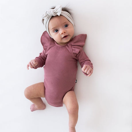 Kyte Baby Ribbed Long Sleeve Ruffle Leotard in Dusty Rose - Princess and the Pea