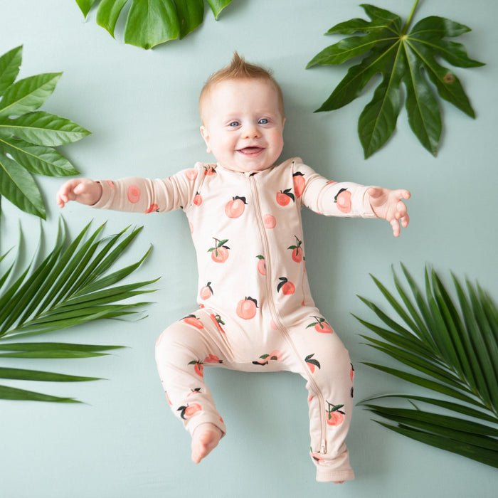 Kyte Baby Zippered Romper in Peach - Princess and the Pea