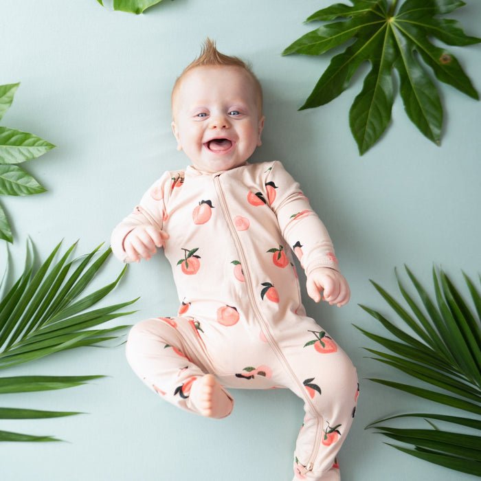 Kyte Baby Zippered Romper in Peach - Princess and the Pea