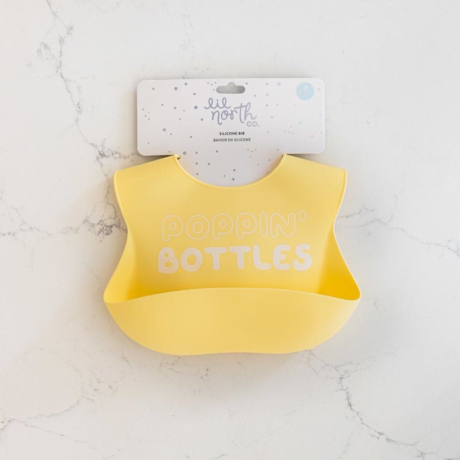 Lil North Co. Poppin Bottles Silicone Bib - Princess and the Pea